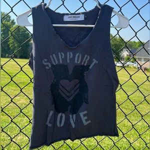 Grey “Support Love” tank top in size large but fits more like a medium.